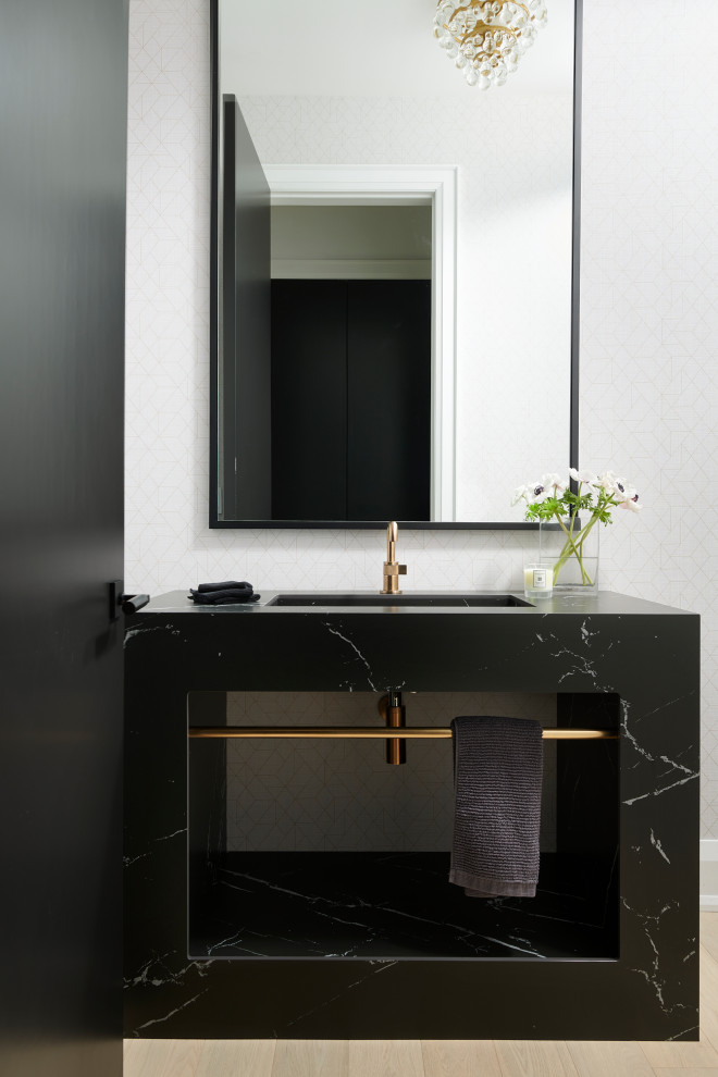 Example of a mid-sized trendy white tile single-sink and wallpaper bathroom design in Toronto with black cabinets, marble countertops, black countertops and a freestanding vanity
