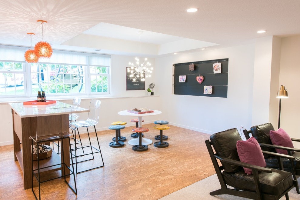 Large contemporary open concept family room in Minneapolis with white walls and cork floors.