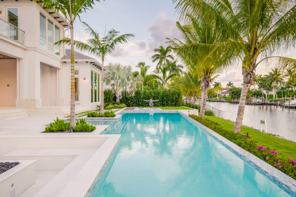This is an example of a beach style pool in Miami.