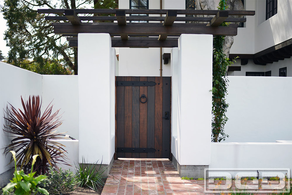 Large elegant white two-story stucco exterior home photo in San Francisco