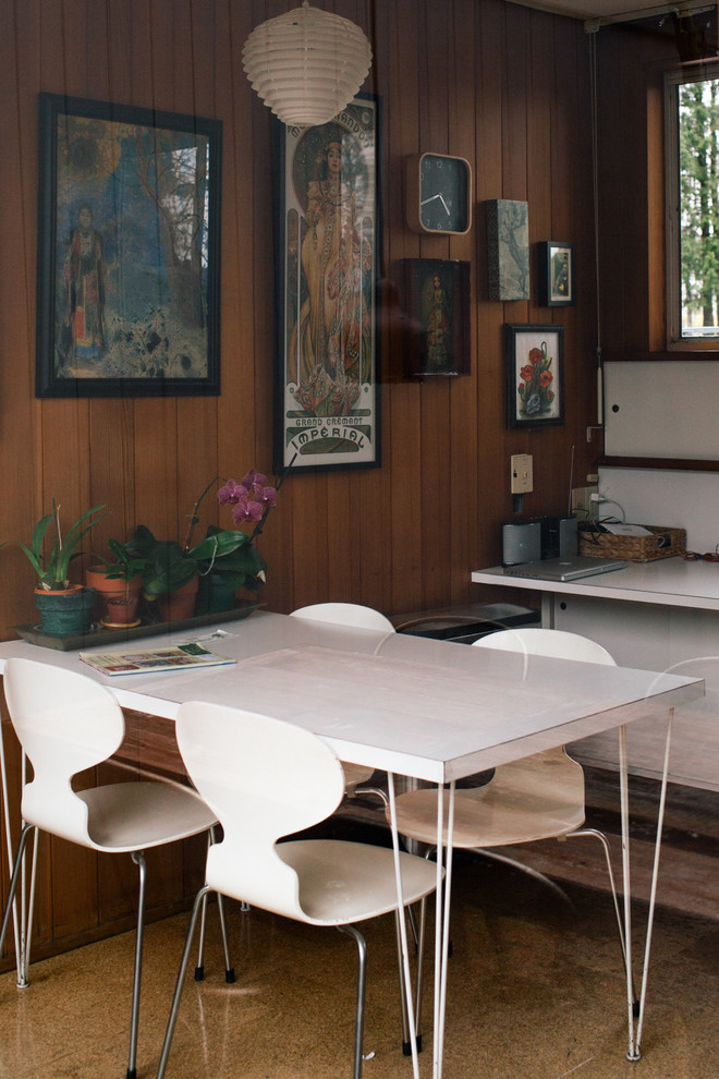 Inspiration for a small midcentury separate dining room in Seattle with cork floors.