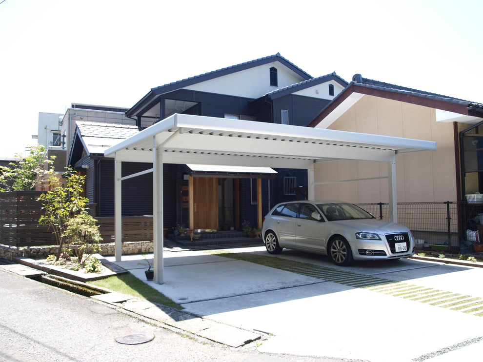 Design ideas for a modern two-storey brown house exterior in Other with metal siding, a gable roof and a mixed roof.