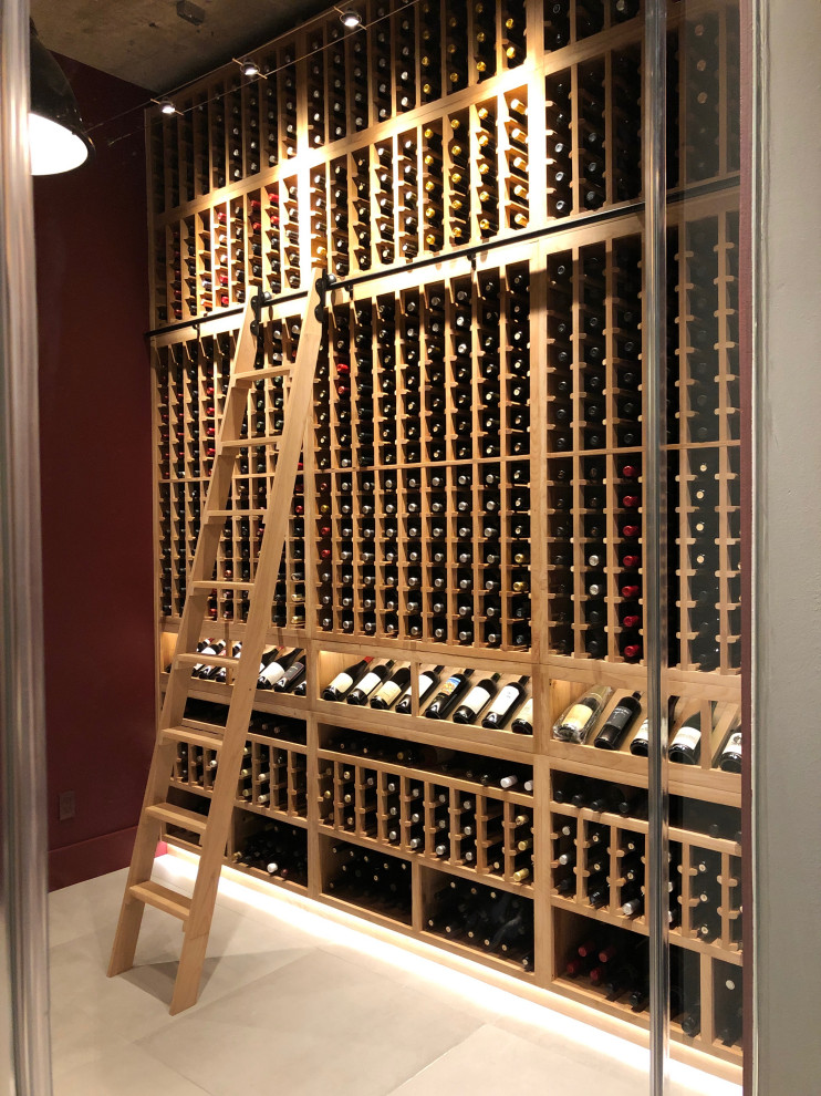 Design ideas for a large arts and crafts wine cellar in Houston with display racks.