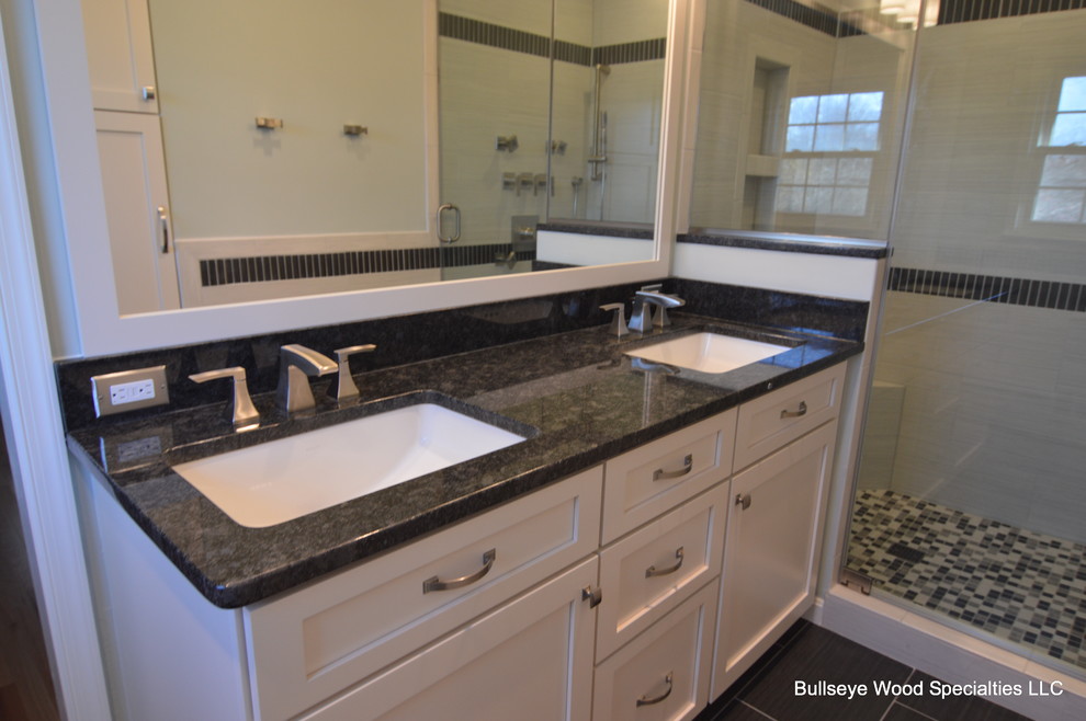 Example of a small transitional master gray tile and ceramic tile ceramic tile alcove shower design in DC Metro with an undermount sink, shaker cabinets, white cabinets, granite countertops, a one-piece toilet and white walls