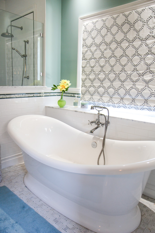 Mid-sized transitional master white tile marble floor freestanding bathtub photo in Atlanta