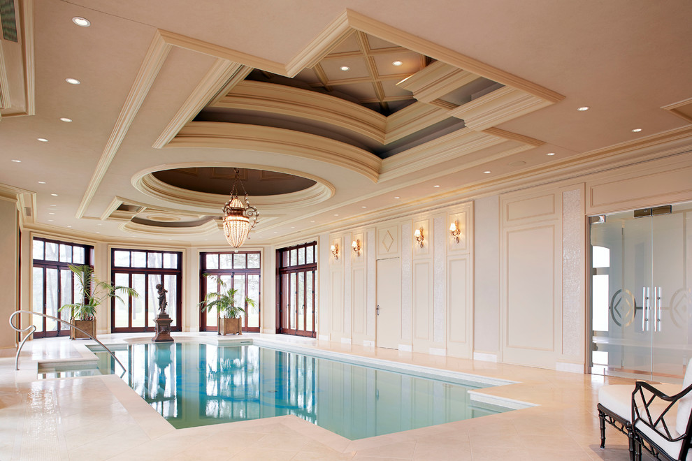 Photo of a large traditional pool in Montreal with tile.
