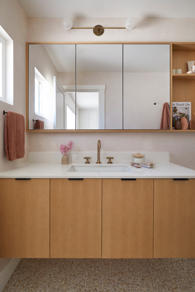 Design ideas for a small scandinavian master bathroom in San Francisco with flat-panel cabinets, brown cabinets, a curbless shower, white tile, ceramic tile, pink walls, terrazzo floors, an undermount sink, engineered quartz benchtops, pink floor, an open shower, white benchtops, a niche, a single vanity and a floating vanity.