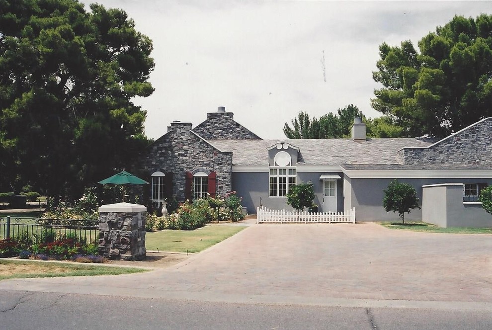 Example of a mountain style exterior home design in Phoenix