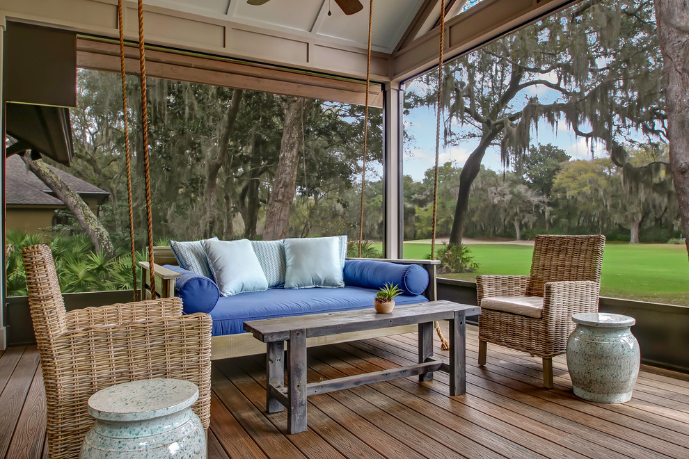 Inspiration for a large transitional backyard verandah in Jacksonville with decking and a roof extension.