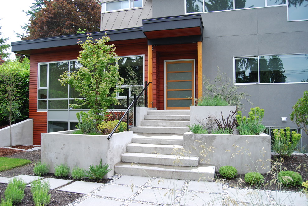 Design ideas for a contemporary two-storey exterior in Vancouver.