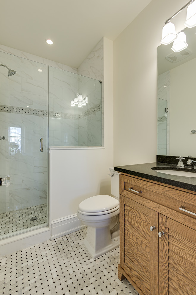Small beach style kids bathroom in Philadelphia with louvered cabinets, light wood cabinets, an alcove shower, a one-piece toilet, white tile, marble, white walls, marble floors, a drop-in sink, marble benchtops and white floor.