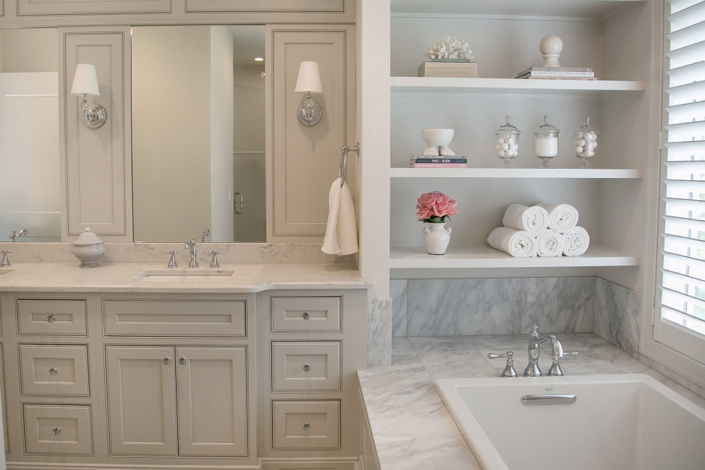 Large classic ensuite bathroom in Milwaukee with beaded cabinets, grey cabinets, a built-in bath, an alcove shower, white tiles, a submerged sink, engineered stone worktops, a hinged door, white worktops, double sinks and a built in vanity unit.