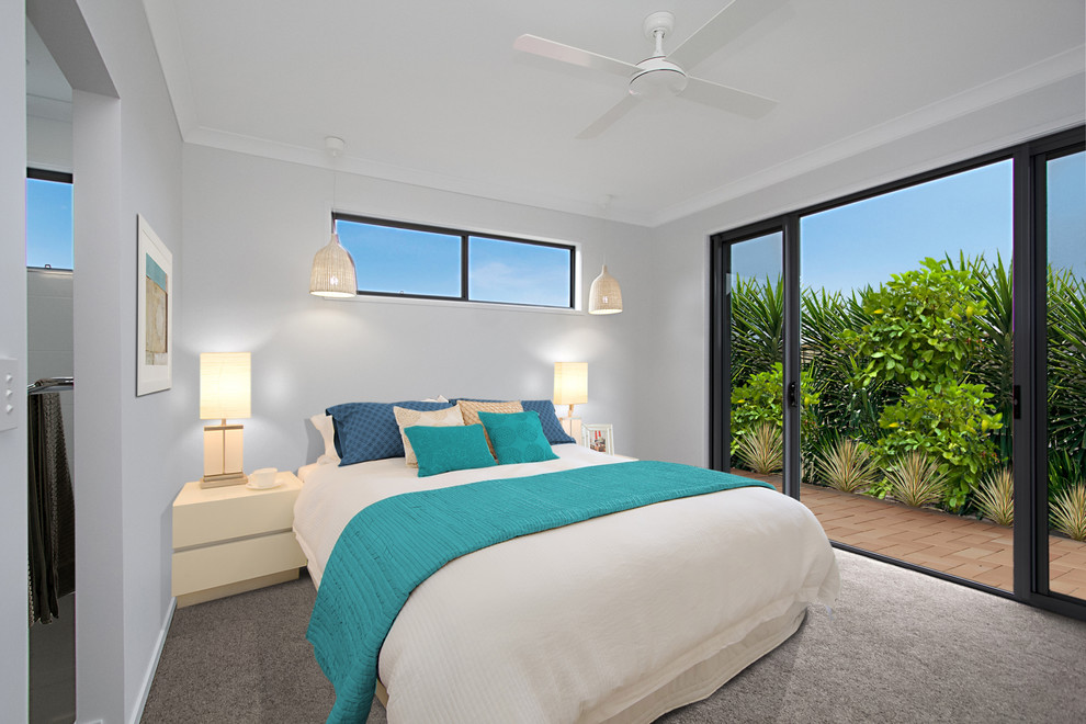 Mid-sized contemporary master bedroom in Gold Coast - Tweed with white walls and carpet.