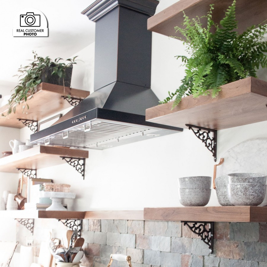 Kitchens featuring a ZLINE Copper Wall Range Hood