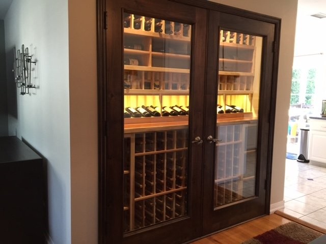 Design ideas for a small traditional wine cellar in Los Angeles with storage racks.