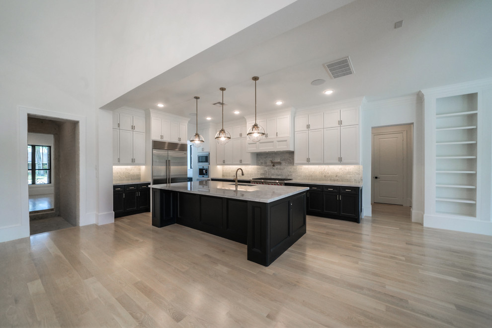 Example of a transitional kitchen design in Houston