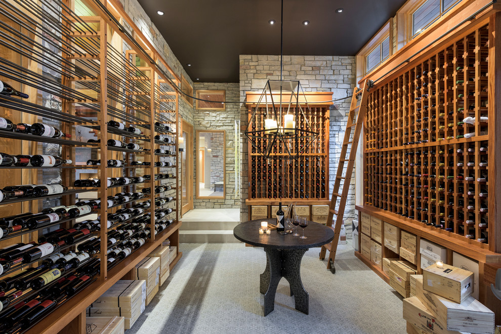 This is an example of a large traditional wine cellar in Minneapolis with storage racks.