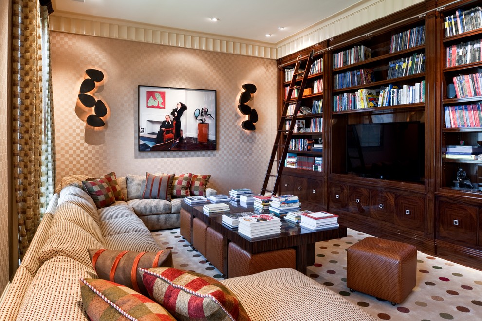 This is an example of a traditional enclosed family room in Philadelphia with beige walls, carpet and a built-in media wall.