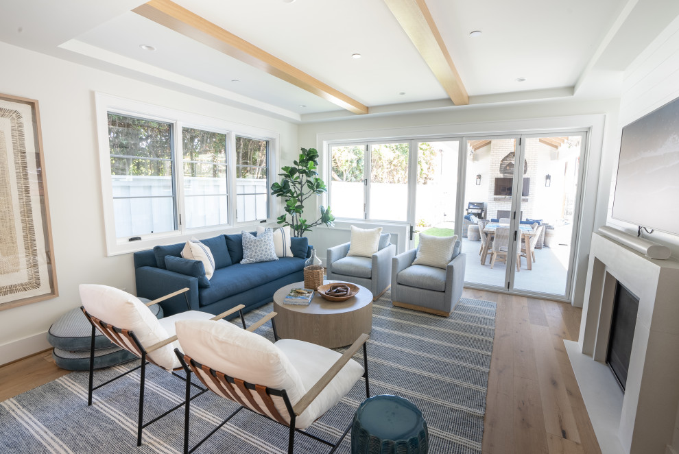 Design ideas for a beach style open concept living room in San Diego.