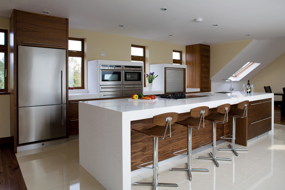 Design ideas for a contemporary galley kitchen in Other with flat-panel cabinets and dark wood cabinets.