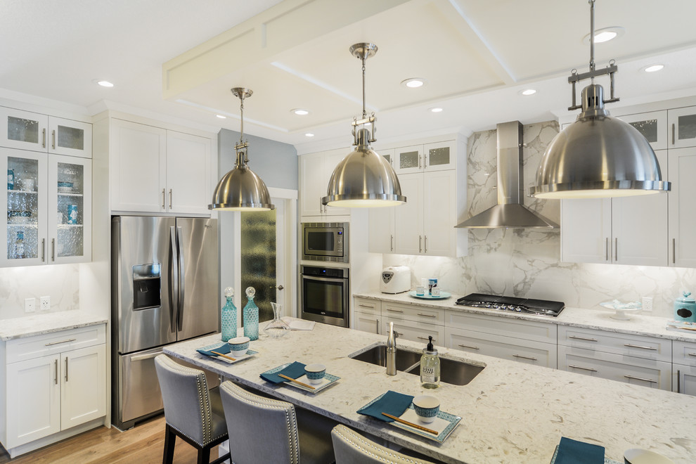 Example of a transitional kitchen design in Calgary with multicolored backsplash and stone tile backsplash