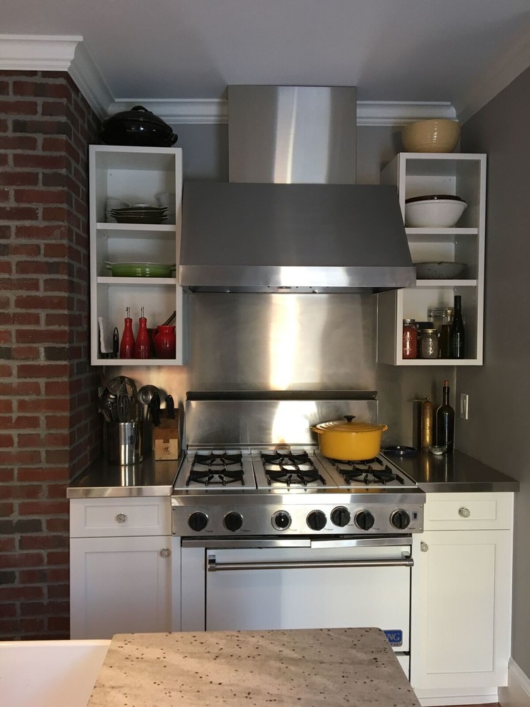 Eat-in kitchen - large transitional l-shaped light wood floor eat-in kitchen idea in Boston with a drop-in sink, shaker cabinets, white cabinets, marble countertops, gray backsplash, stainless steel appliances and an island