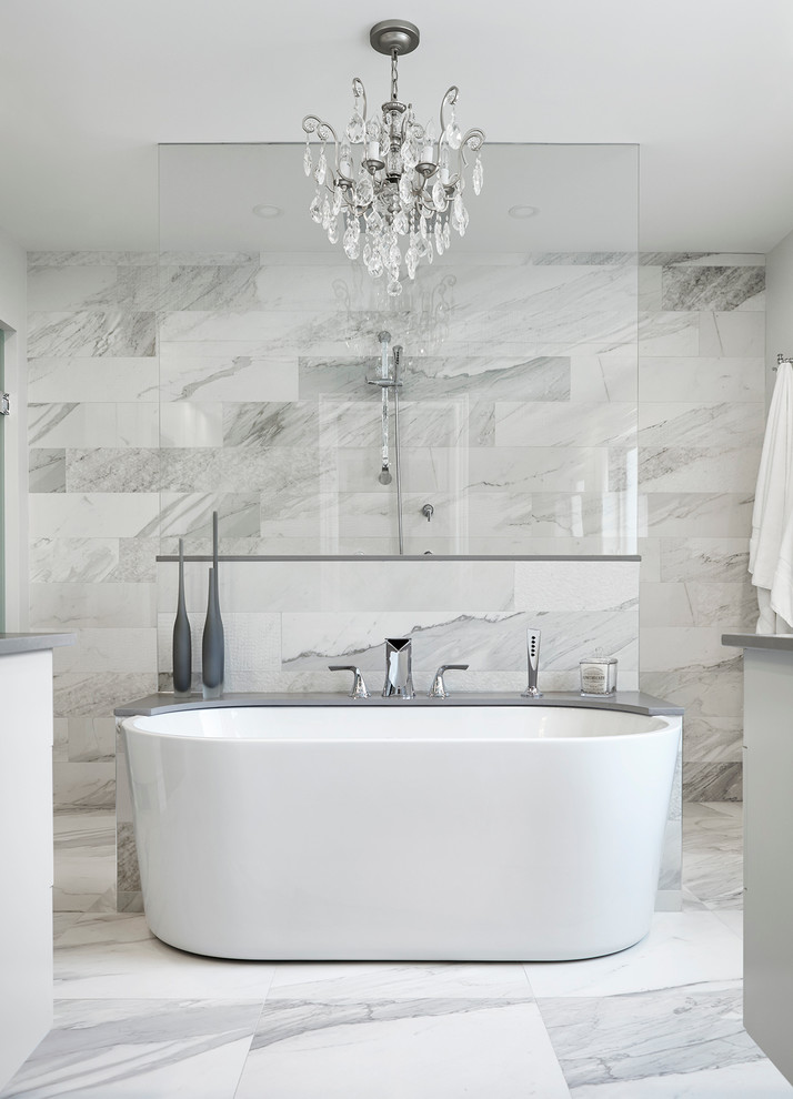 Design ideas for a transitional master bathroom in Toronto with a freestanding tub, a curbless shower, gray tile, white tile, marble floors, flat-panel cabinets, white cabinets, marble and an open shower.