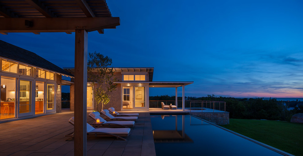 Example of a beach style exterior home design in Providence
