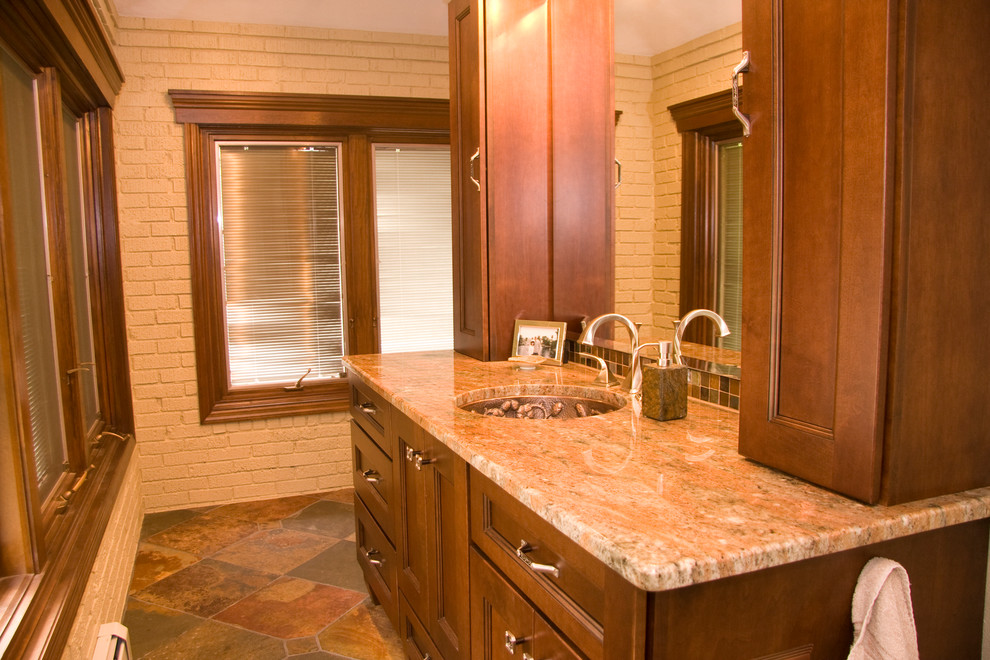 Traditional bathroom in St Louis with an undermount sink, furniture-like cabinets, medium wood cabinets, granite benchtops, an open shower, a two-piece toilet, multi-coloured tile and stone tile.