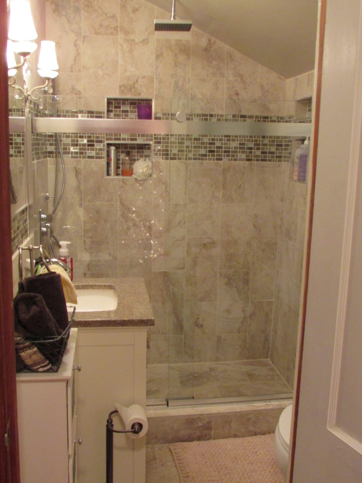 Inspiration for a small transitional master beige tile and ceramic tile ceramic tile home design remodel with furniture-like cabinets, white cabinets, a two-piece toilet, beige walls, an integrated sink and quartz countertops