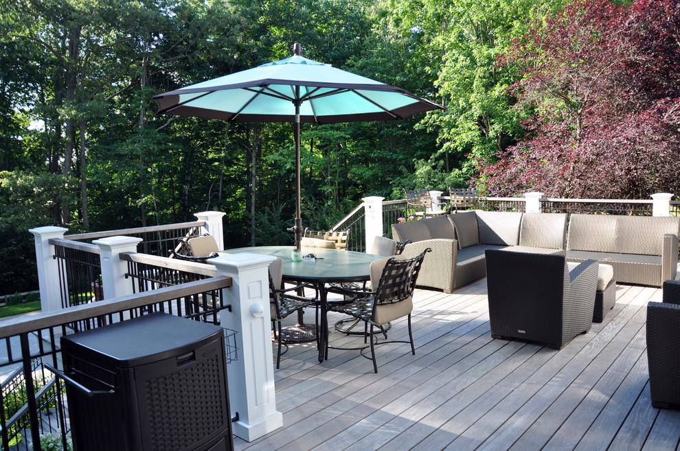 Design ideas for an expansive arts and crafts backyard deck in DC Metro with no cover.