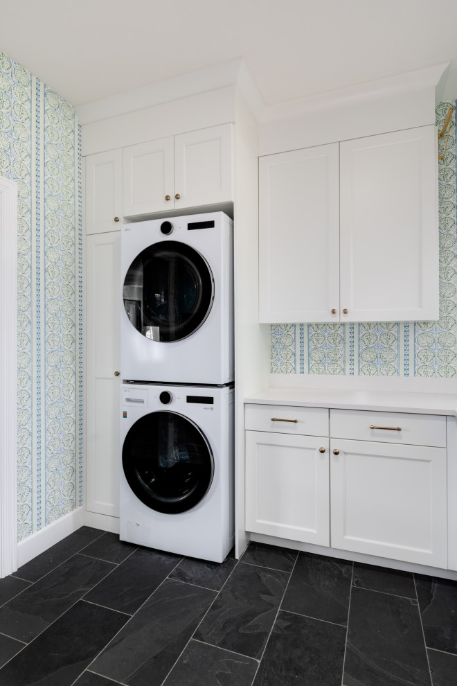 Example of a transitional laundry room design in Denver