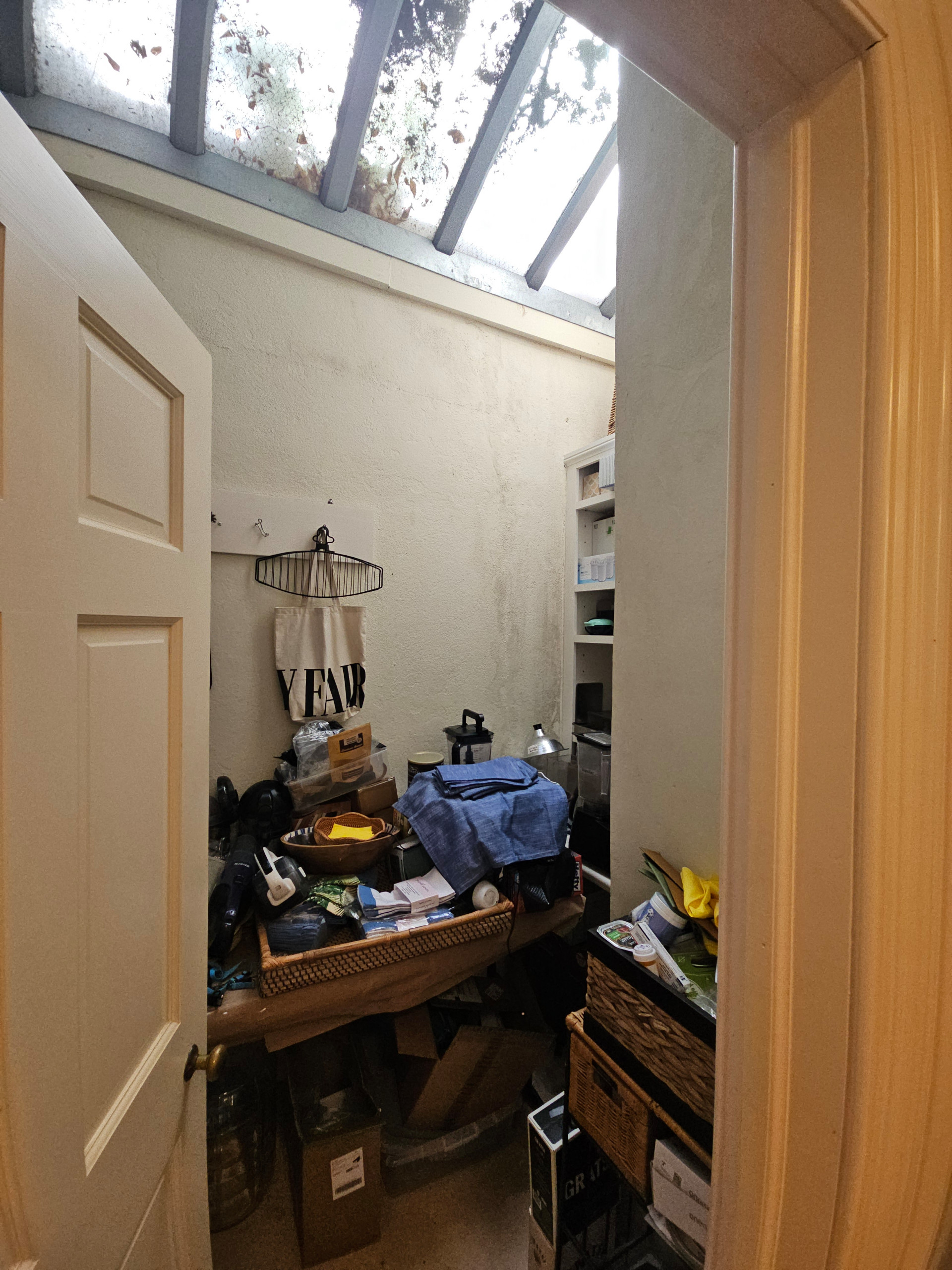 BEFORE storage under skylights