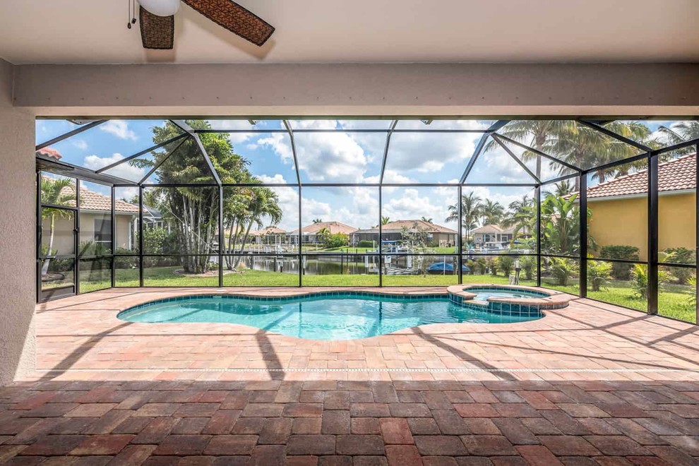 Inspiration for a transitional pool remodel in Miami