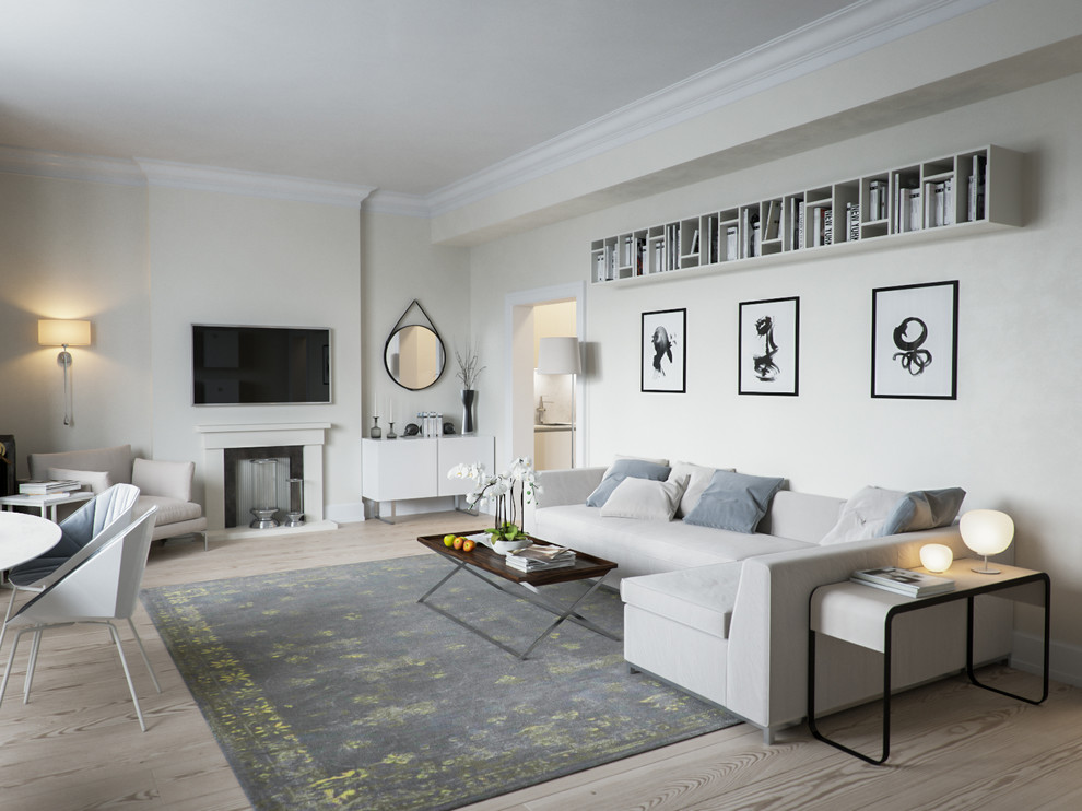 This is an example of a mid-sized scandinavian formal open concept living room in London with a wall-mounted tv, light hardwood floors, a standard fireplace and grey walls.