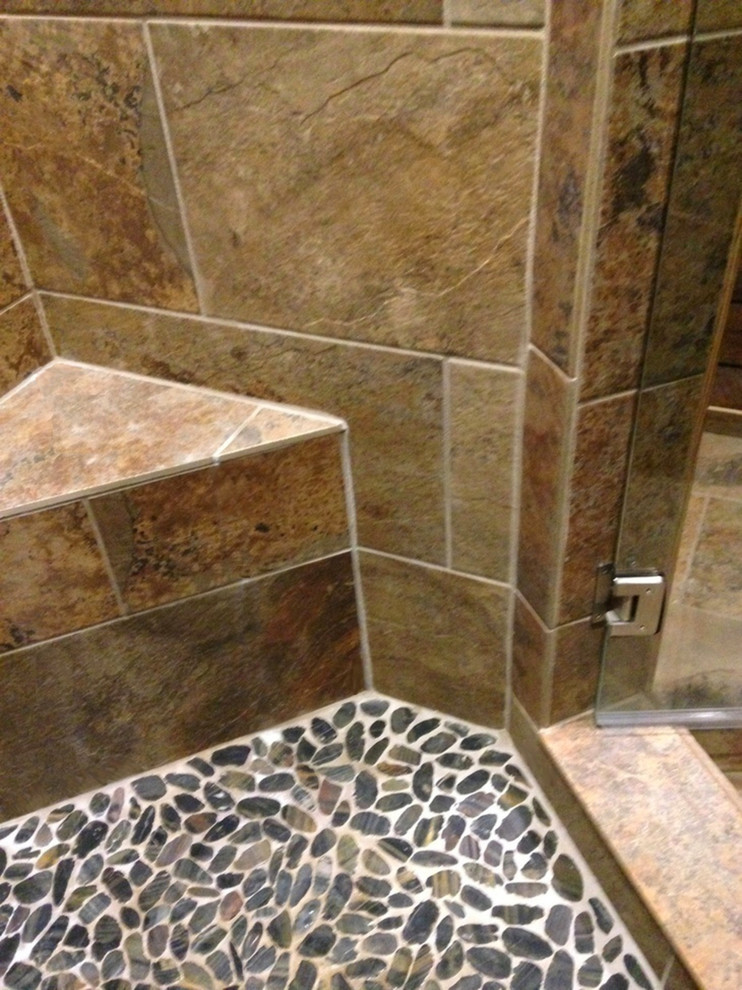 Mountain style beige tile and porcelain tile bathroom photo in Little Rock