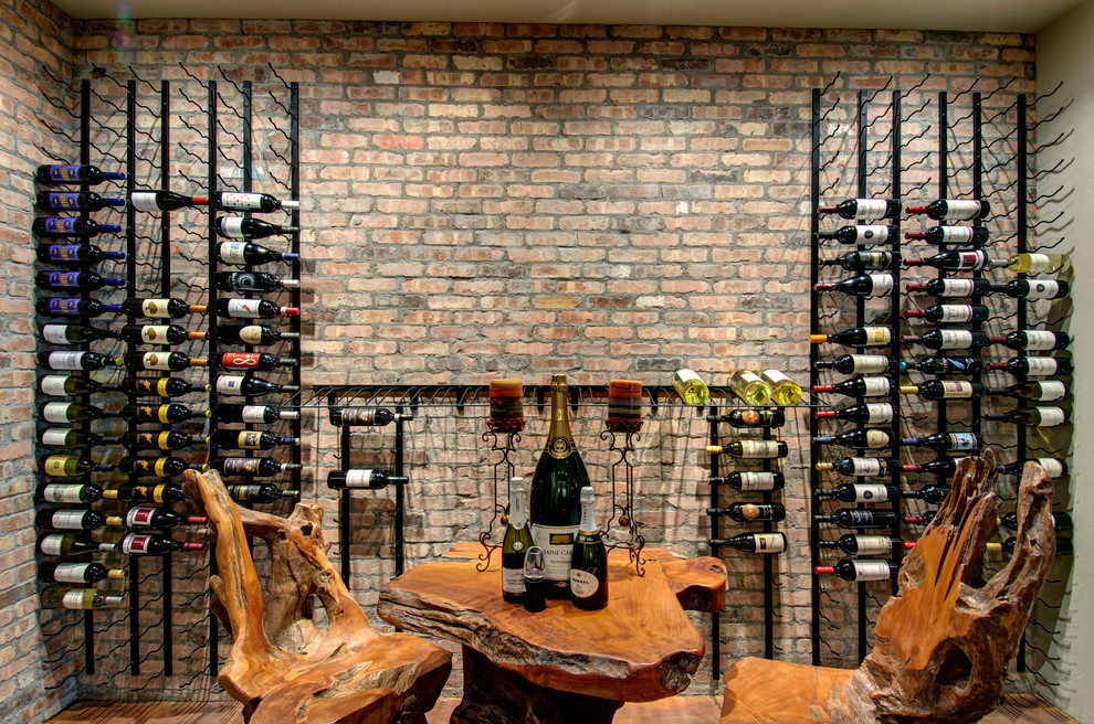 Inspiration for a contemporary wine cellar in Denver with display racks.