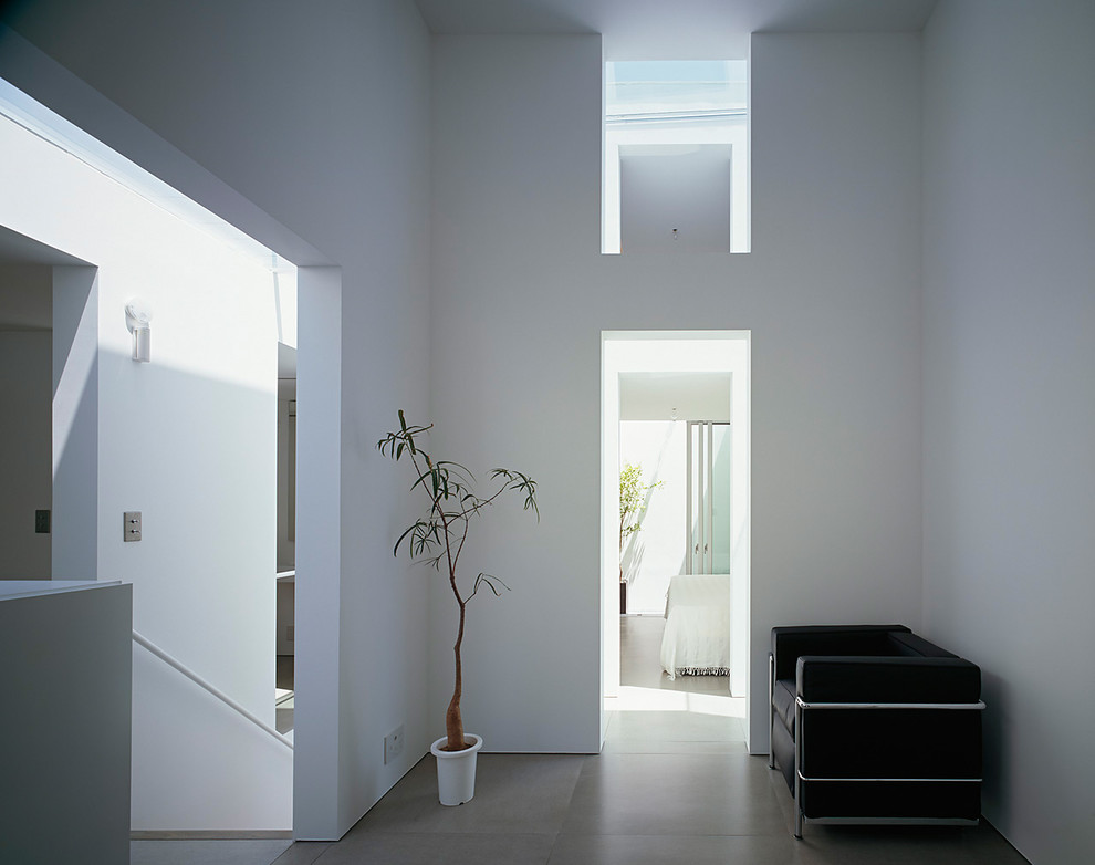 Photo of a small contemporary open concept living room in Tokyo Suburbs with white walls.