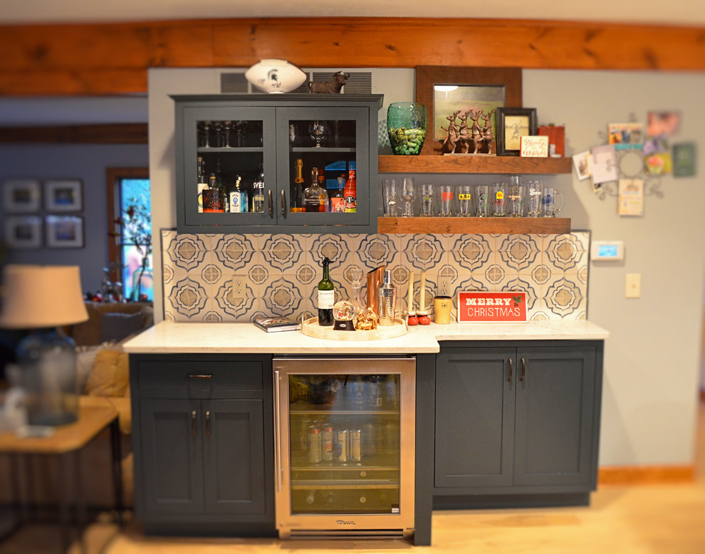 Photo of a country home bar in Other with beaded inset cabinets, quartz benchtops, multi-coloured splashback and ceramic splashback.