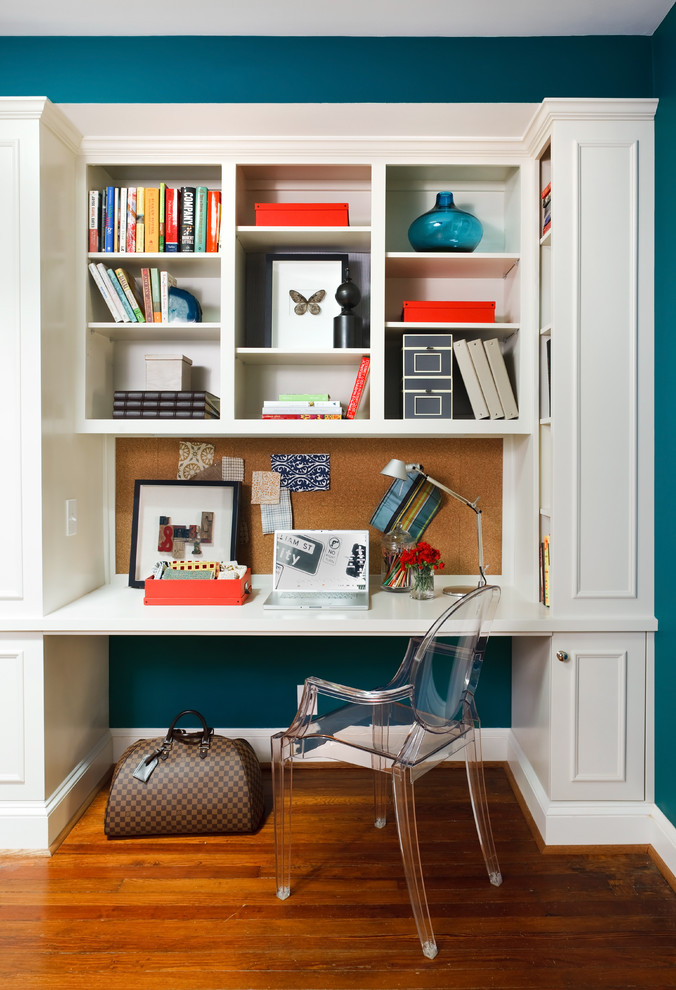 Design ideas for a traditional home office in DC Metro with a built-in desk.