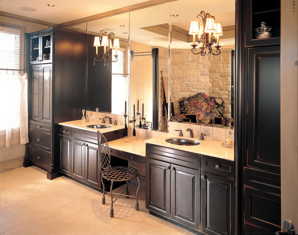 Traditional bathroom in Other with an undermount sink and distressed cabinets.