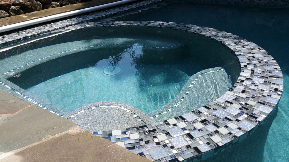 Mid-sized transitional backyard stone and rectangular lap pool fountain photo in San Francisco