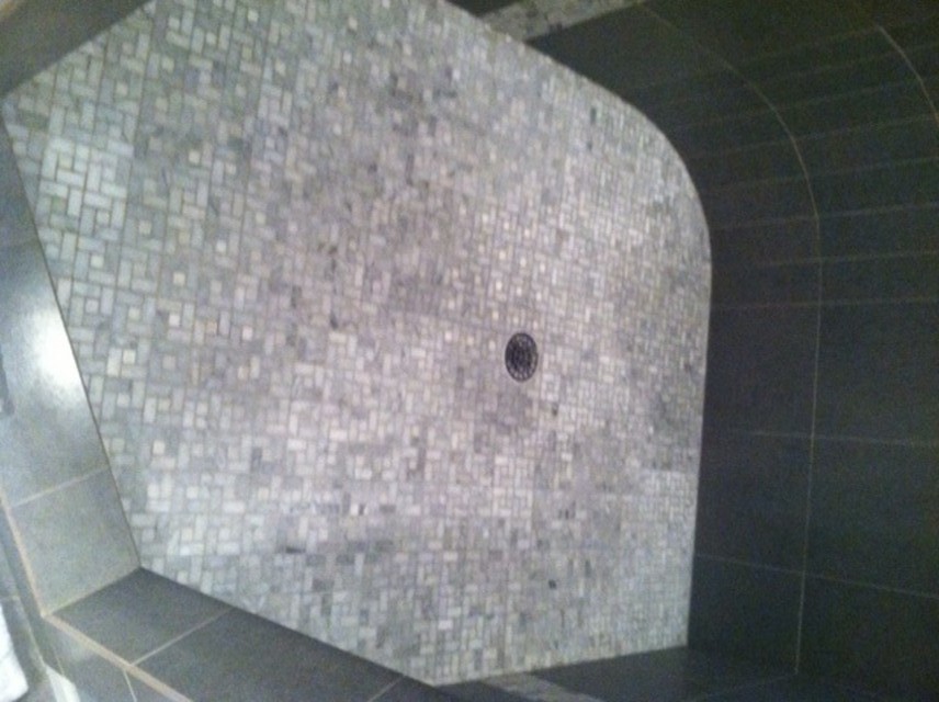 tile help! what is wrong with my shower floor?!