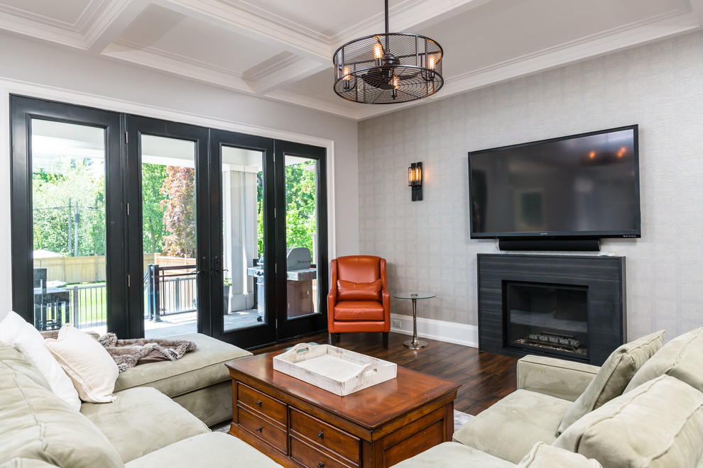 This is an example of a mid-sized transitional formal open concept living room in Toronto with white walls, dark hardwood floors, a ribbon fireplace, a stone fireplace surround, no tv and brown floor.
