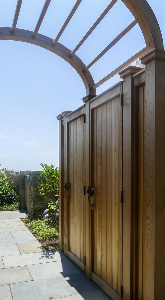 Mid-sized transitional dark wood floor front door photo in Boston with white walls and a white front door