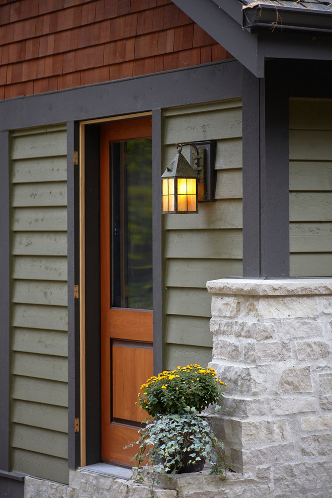 Inspiration for a rustic entryway remodel in Milwaukee