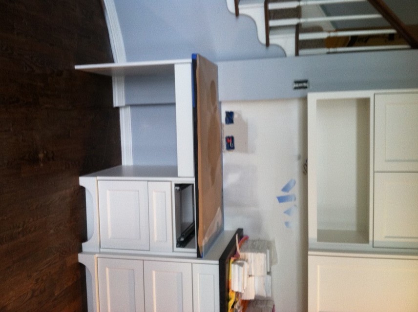 Do you have a builtin bulletin board in kitchen desk area?