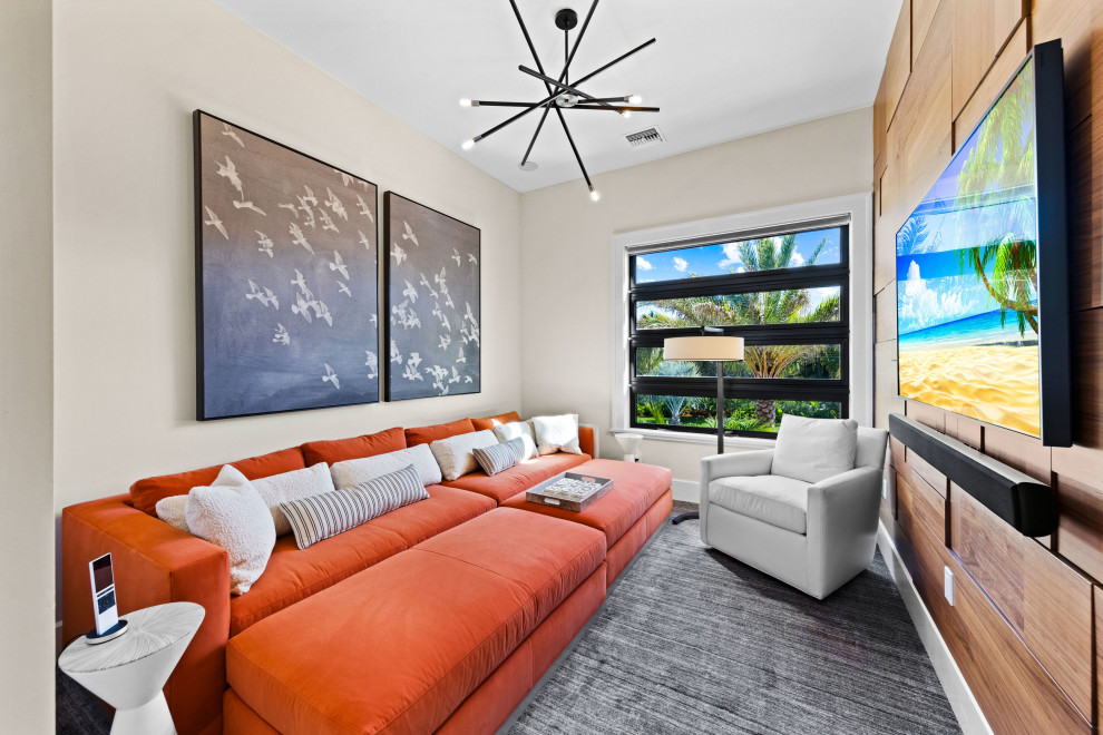 На фото: двухуровневая гостиная комната среднего размера в современном стиле с белыми стенами, ковровым покрытием, телевизором на стене и синим полом с