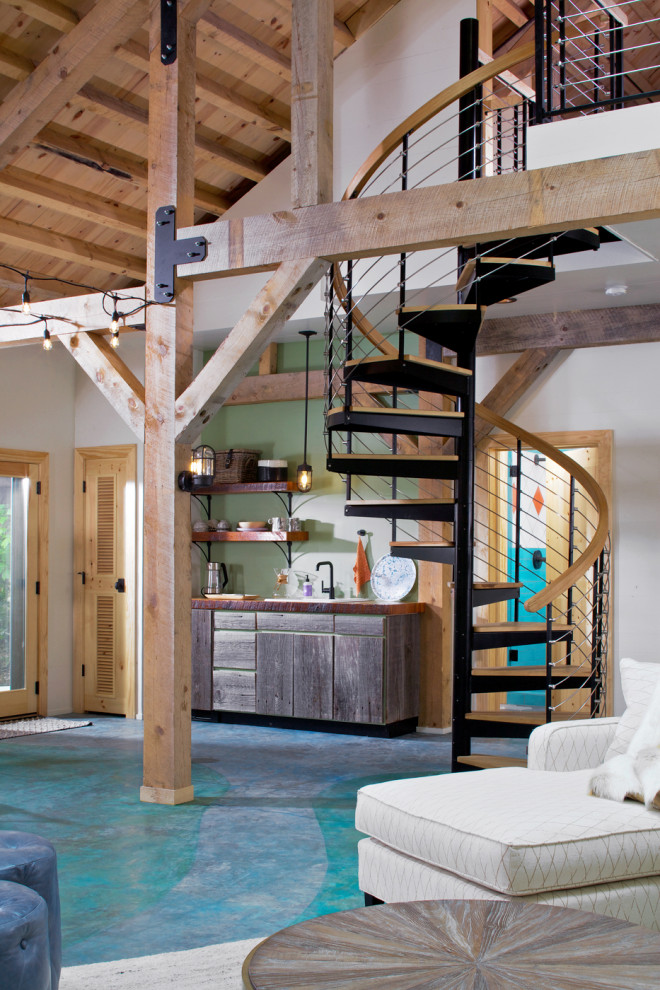 Inspiration for a country wood spiral staircase in Other with open risers and cable railing.