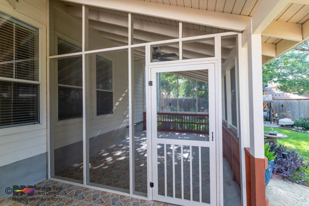 Photo of a large contemporary back screened veranda in Austin with tiled flooring and a roof extension.